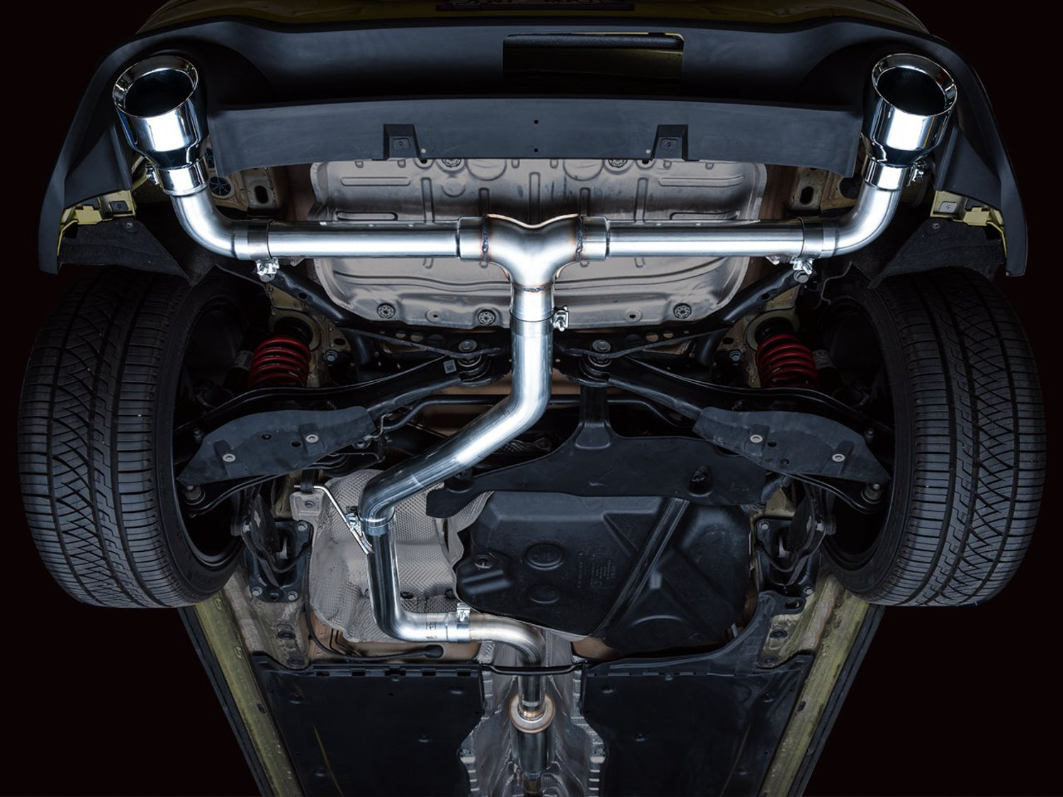 Underside of a Mk8 GTI with the AWE Track Edition cat-back and T-split fitted