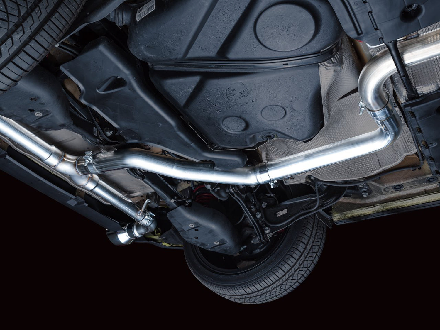 Side underbody view of the AWE Track Edition mid section on the Mk8 GTI