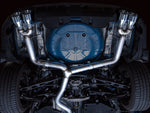 Underside of a blue VB WRX with the AWE Track Edition cat-back installed, no rear mufflers