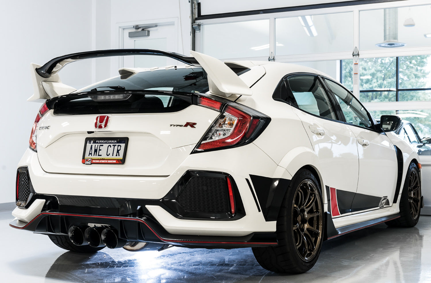 White FK8 Type R from the rear corner with AWE Diamond Black Track tips