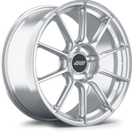 Silver machined aluminum wheel with ten-spoke design and black center cap on white background - APEX Wheels wheel for 19x9 ET50 5x130 - Brushed Clear