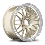 Gold finished alloy wheel with multi-spoke design and polished silver lip displayed at angle on white background - APEX Wheels wheel for 19x9.5 ET48 PSCL - Gloss Motorsport Gold - Machined Lip