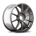 Silver alloy wheel with ten-spoke design, visible center hub and curved barrel profile on plain background - APEX Wheels wheel for 19x9.5 ET50 PSCL - Anthracite