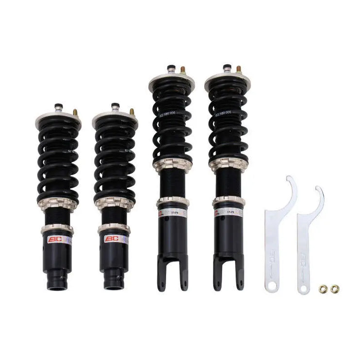 A front view of BC Racing BR Series Fork-style Rear Coilovers (EK/EM) for Honda Civic CX / Si 1996-2000 with white background