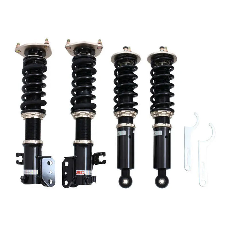 A front view of BC Racing BR Series Coilovers (A32) for Nissan Maxima 1995-1999 with white background