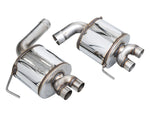 Two AWE 180 Technology rear muffler sections with quad outlets for the EJ25 STI, shown on white