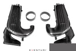 Two carbon fiber intake tubes with curved design and metal connecting rings on white background - Eventuri cold air intake for Mercedes-Benz C253 GLC63 AMG C253 GLC63S AMG