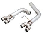 Two AWE Track straight rear sections with split outlets for the VA WRX, no tips, shown on white