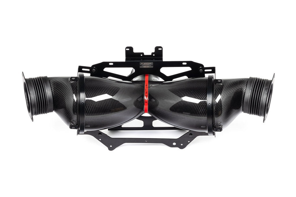 Complete carbon fiber intake system with dual inlet tubes, black mounting brackets, and metal support frame on white background - Eventuri intake for Chevrolet Corvette