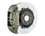 A front view of Brembo 332x322-Piece 4-Piston Iron Slotted Rotors for Porsche 964 Carrera 2 / 4 with white background