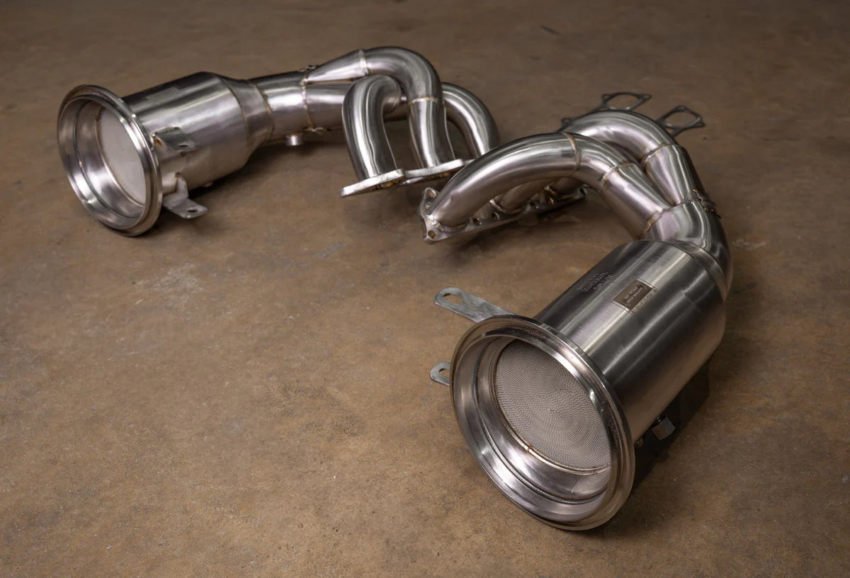 Valvetronic Designs EPA-compliant 400-cell high-flow catted downpipes for Porsche 992 GT3 and GT3 RS, polished stainless steel.