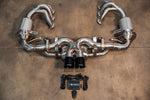Top-down view of the full exhaust system including the valved center muffler, high-flow headers with mesh-wrapped sections, and the electronic control kit.