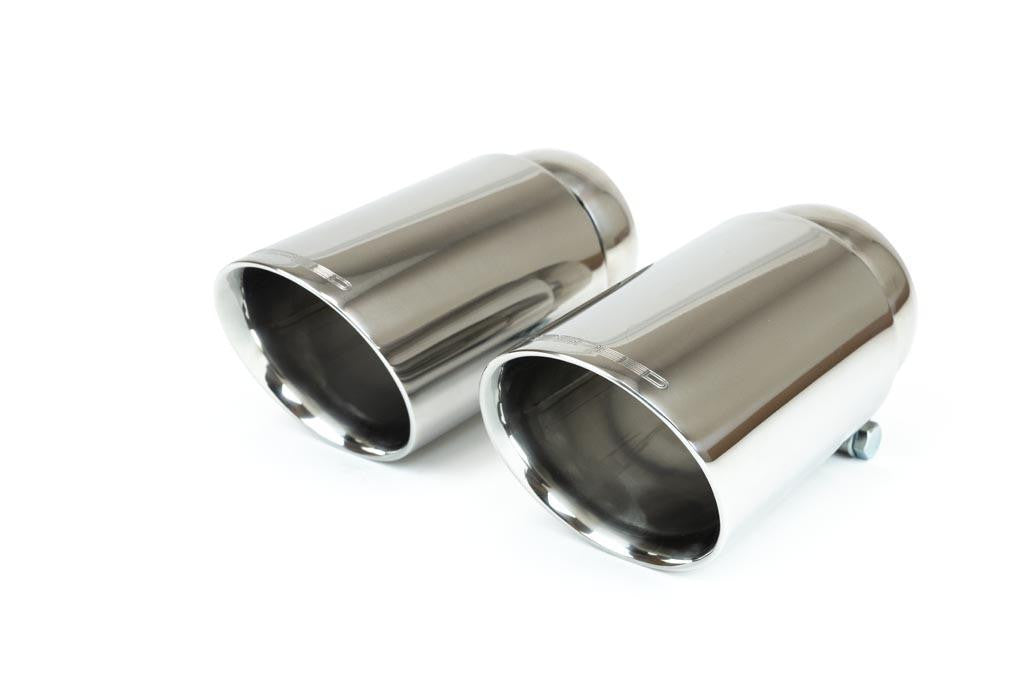 Close-up of a pair of polished chrome dual-wall exhaust tips with the Fabspeed logo etched on the top edge.