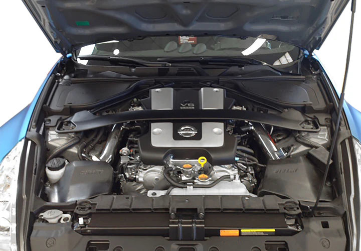 Wide shot of Stillen Dual Long Tube Air Intake (Gen 2) [Z34] - Dry Filter for Nissan 370Z 2009-2020 fitted inside a car