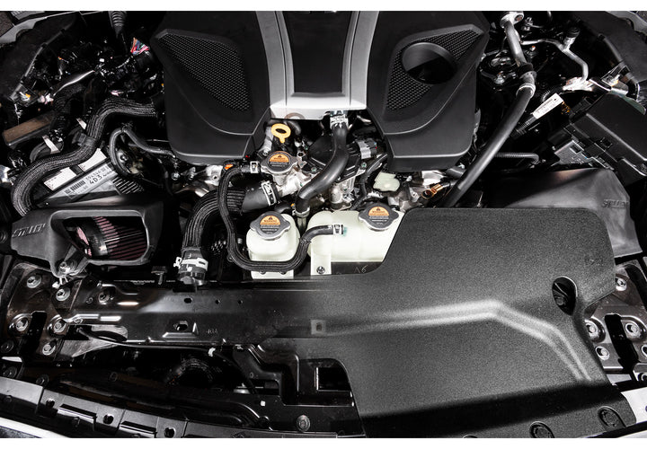 Close-up view of Stillen Hi-Flow Air Intake - Dry Filter for Infiniti Q50 / Q60 3.0t (2016-2018) fitted inside a car