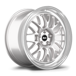 Silver aluminum wheel with multi-spoke design and polished lip shown at angle on white background - APEX Wheels wheel for 17x9 ET42 5x100 - Race Silver - Machined Lip