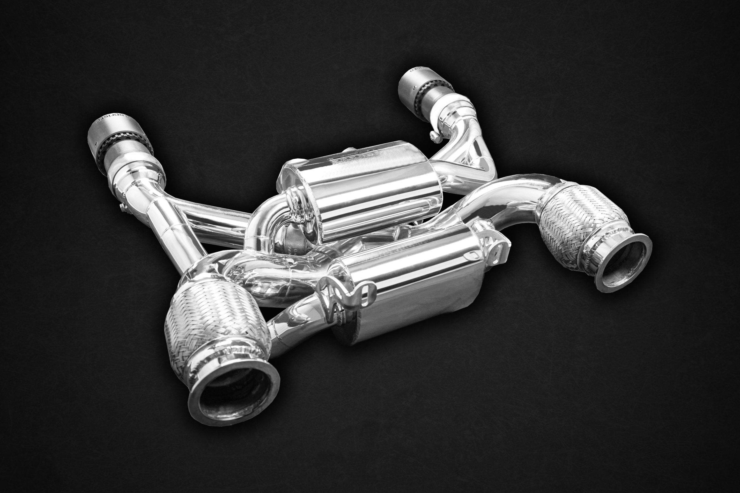 Capristo McLaren 720S valved exhaust angled view with downpipes and round outlets