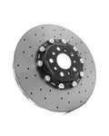Front carbon-ceramic rotor with drilled friction ring