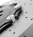 Front carbon-ceramic rotor attachment bolts in close-up