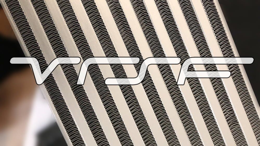 Close-up of the VRSF logo stencil painted across the intercooler fins, an optional add-on