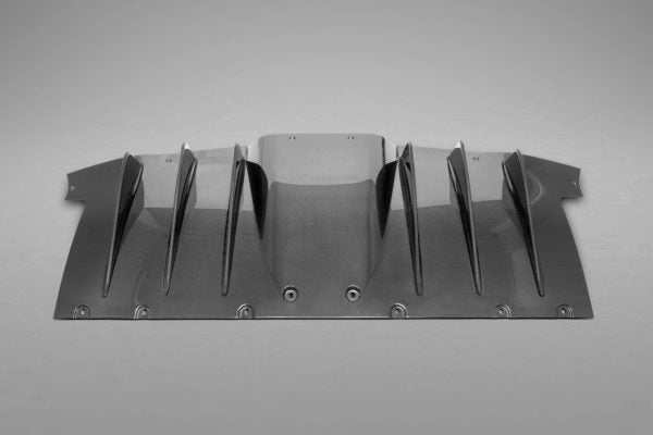 close view of Capristo Carbon Rear Diffuser (Matte) for Ferrari 458 Italia/Spider 2009-2015 with grey background