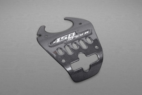 wide view of Capistro Carbon Lock Cover (Matte) for Ferrari 458 Spider 2011-2015 with grey background