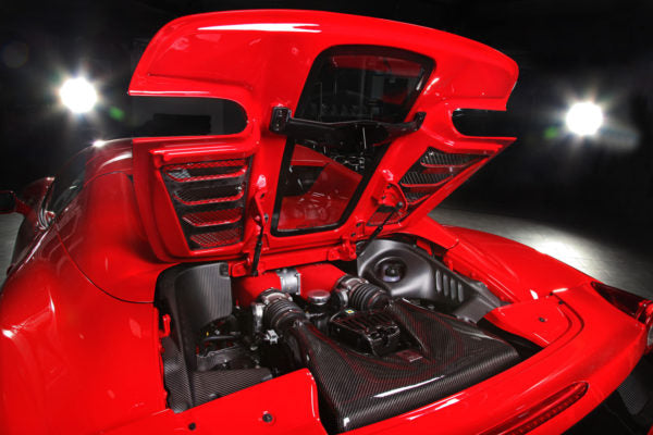 wide view of Capistro Primed Top / Clear Gloss Bottom Carbon and Glass Bonnet Raw for Ferrari 458 Spider 2011-2015 fitted inside a red car