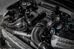 Carbon fiber intake system with curved tubes and airbox installed in engine bay - Eventuri intake for Porsche 911