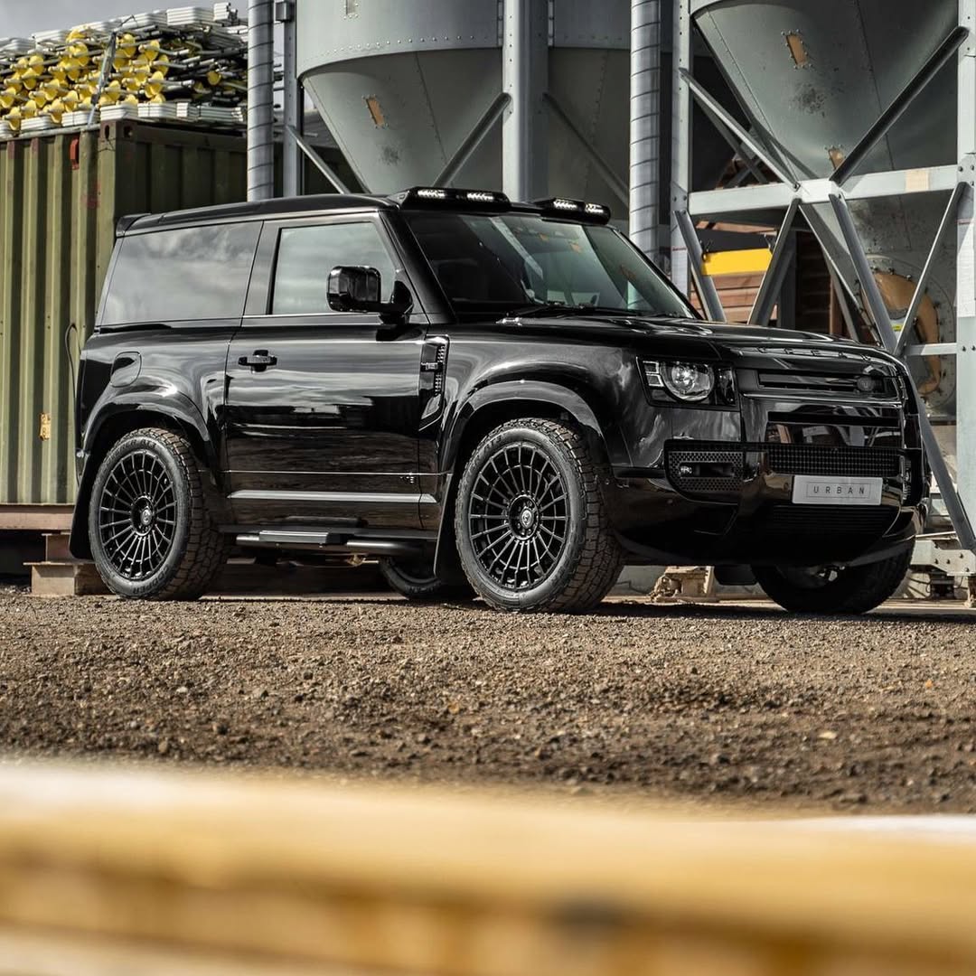 Land Rover Defender with Urban Widetrack fender arches parked outdoors