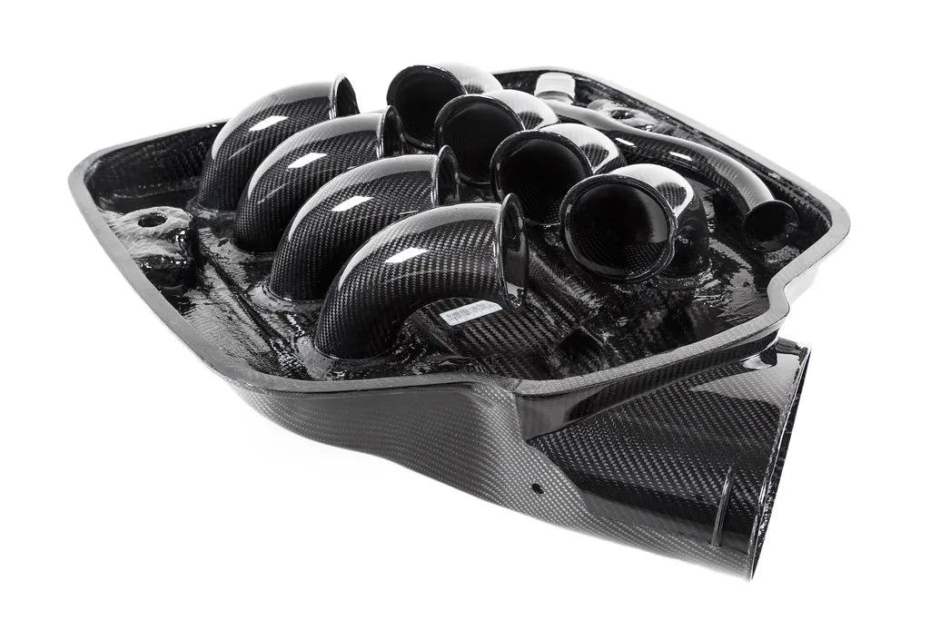 Angled underside of the Eventuri E9X plenum showing the carbon runners