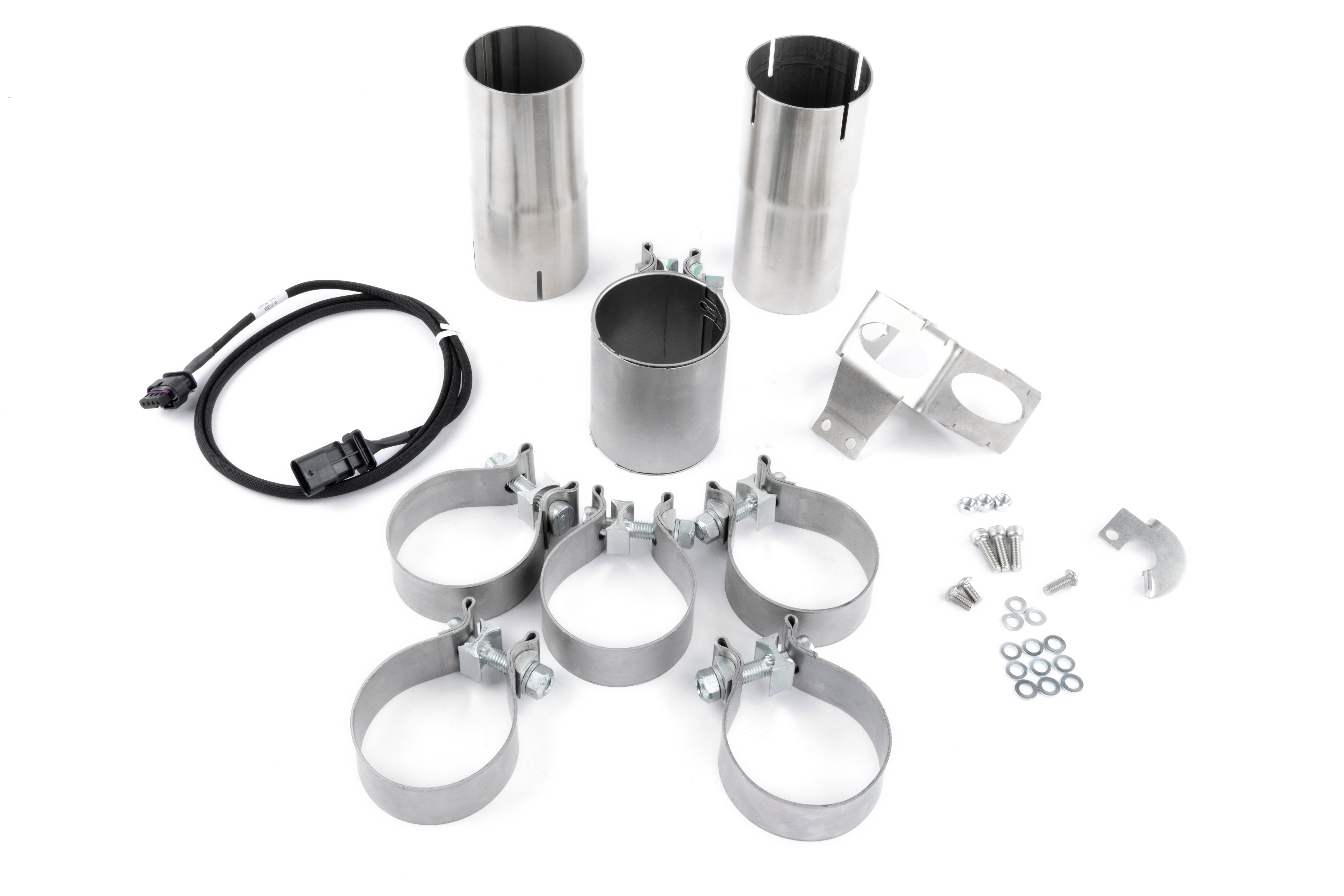 A wide-angle studio shot of the complete  accessories including polished tips for the Dinan Valved Cat-Back Exhaust System. The system is displayed on a white background.