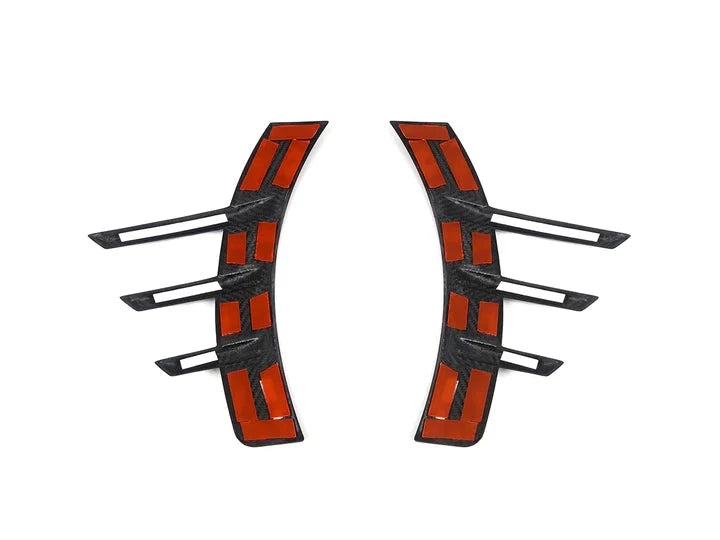 A back view of AUTOTECKNIC DRY CARBON REAR FENDER ARCH TRIM SET - BMW G87 M2 2023+ with white background