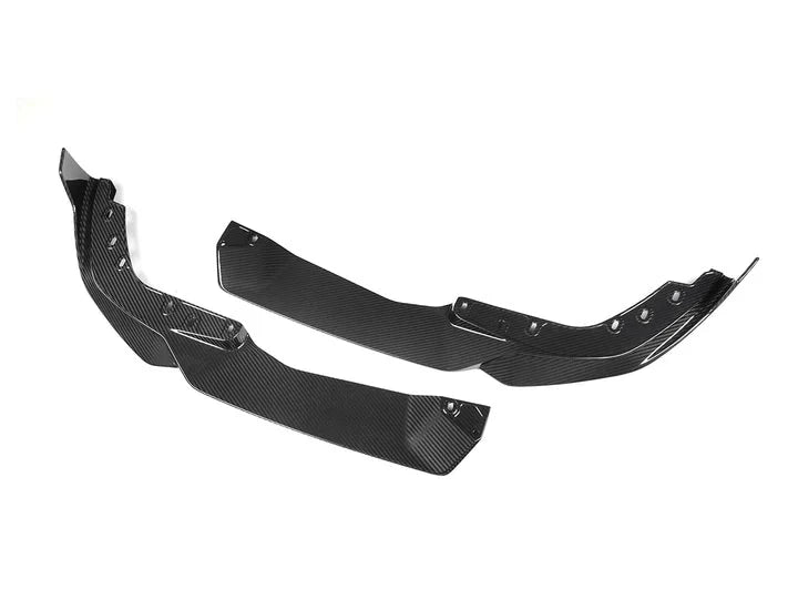 A side view of AUTOTECKNIC DRY CARBON PERFORMANTE FRONT SPLITTER SET - BMW G20 3-SERIES M-SPORT LCI 2022+ with white background