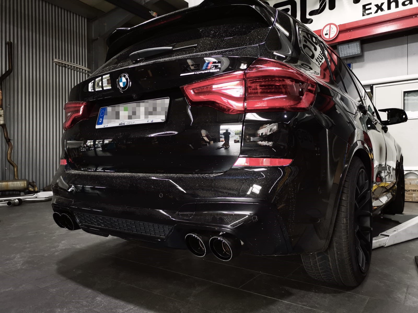 Black BMW X3 M Competition rear with Capristo quad exhaust tips