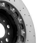 Close-up of rear carbon-ceramic rotor ring and hat