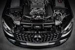Black carbon fiber cold air intake system installed in Mercedes GLC63 engine bay with V8 engine - Eventuri cold air intake for Mercedes-Benz C253 GLC63 AMG C253 GLC63S AMG