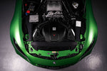 Carbon fiber intake system installed in green Mercedes-AMG GT engine bay with dual conical air filters - Eventuri cold air intake for Mercedes-Benz C190 AMG GT S R190 AMG GT C AMG GT R AMG GT
