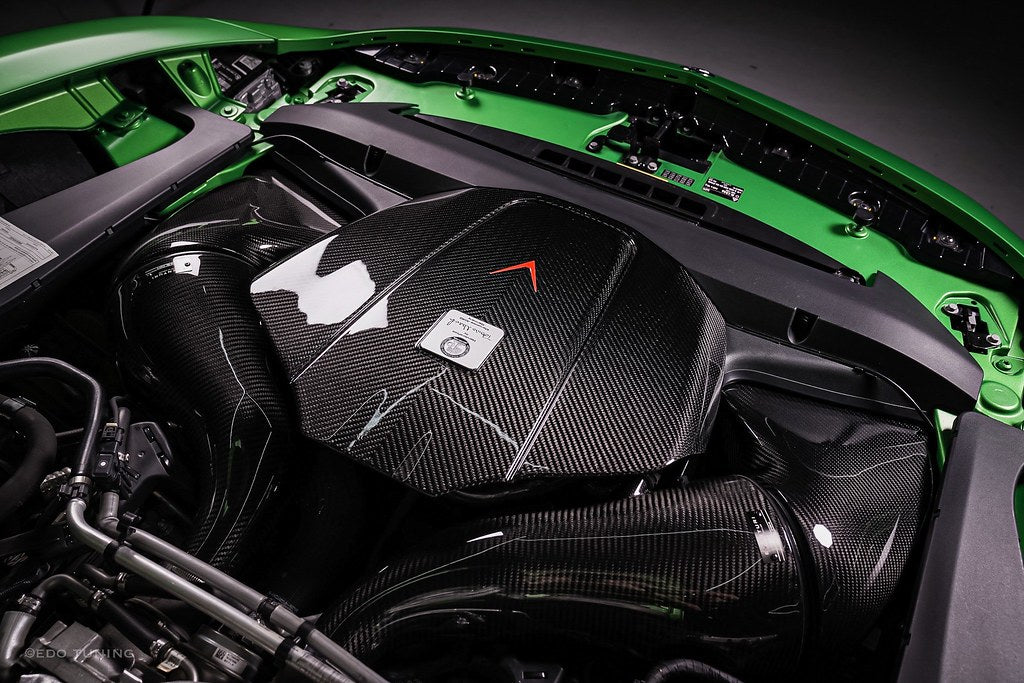 Carbon fiber cold air intake system installed in green Mercedes AMG GT engine bay with intake ducts - Eventuri cold air intake for Mercedes-Benz C190 AMG GT S R190 AMG GT C AMG GT R AMG GT