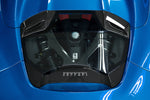 Capristo carbon and glass engine bonnet on a blue Ferrari 488 Spider showing the engine