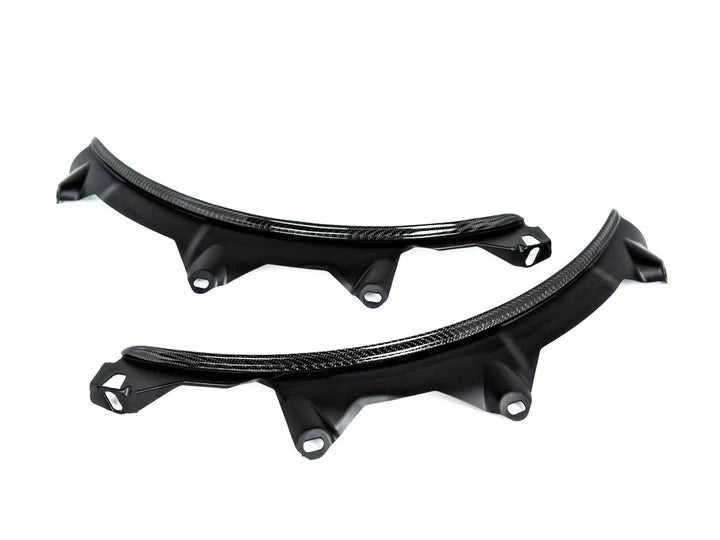 A front view of AUTOTECKNIC CARBON FIBER REAR WHEEL ARCH EXTENSION SET - BMW G30/ G31 5-SERIES 2017+ with white background