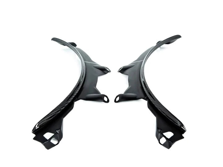 A front view of AUTOTECKNIC CARBON FIBER REAR WHEEL ARCH EXTENSION SET - BMW G30/ G31 5-SERIES 2017+ with white background