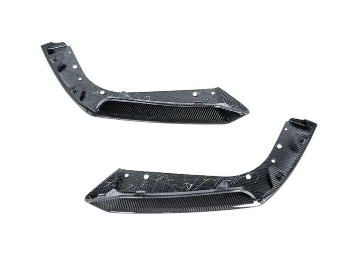 A front view of AUTOTECKNIC PERFORMANCE DRY CARBON SPLITTER SET - BMW F95 X5M 2019+ with white background