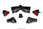 Complete carbon fiber air intake system components with red conical filters and curved intake tubes arranged on white background - Eventuri air intake system for Porsche GT3RS