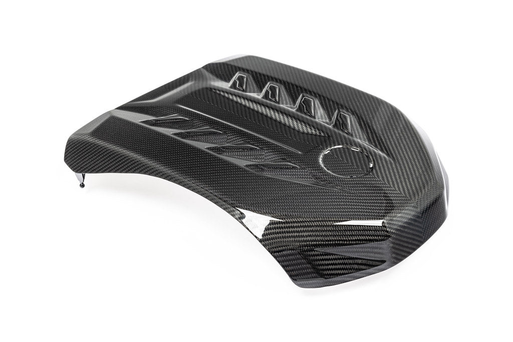 Carbon fiber intake airbox with curved design, multiple velocity stacks, and glossy finish on white background - Eventuri intake for BMW X5 M50i