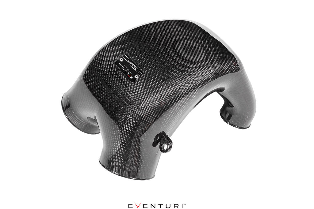 Carbon fiber intake cover with curved airbox shape and branded label, showing glossy weave pattern finish - Eventuri intake system for Porsche 9YB Cayenne Coupe 9YA Cayenne