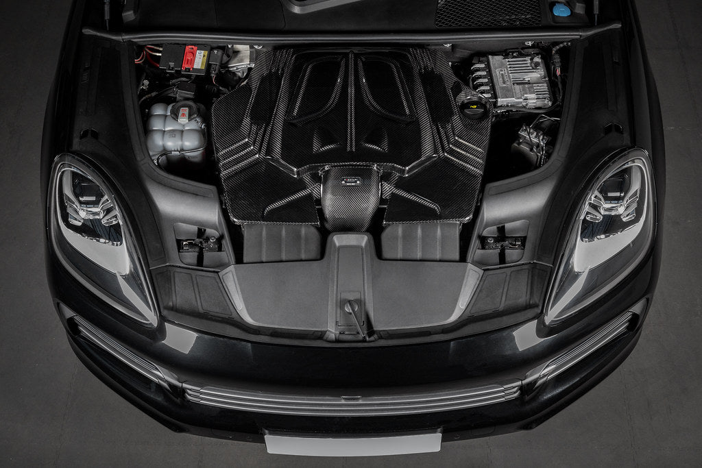 Carbon fiber intake system components installed in Porsche engine bay with hood open showing dual intake boxes - Eventuri intake system for Porsche 9YB Cayenne Coupe 9YA Cayenne