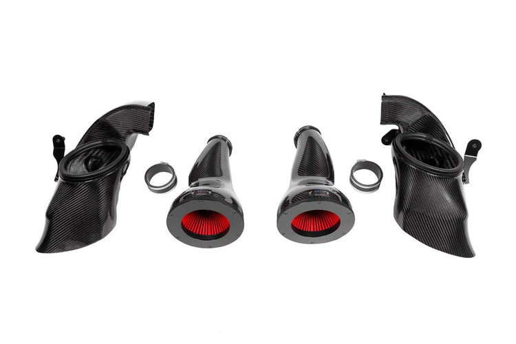 A front view of Eventuri Black Carbon Intake System for BMW G90 M5 2025+ with white background
