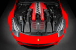 A top wide view of Eventuri Carbon Intake System for Ferrari F12 Berlinetta 2012-2017 fitted inside a red car on a black background
