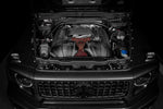 Carbon fiber intake system with red center panel installed in Mercedes engine bay - Eventuri cold air intake for Mercedes-Benz G63 AMG