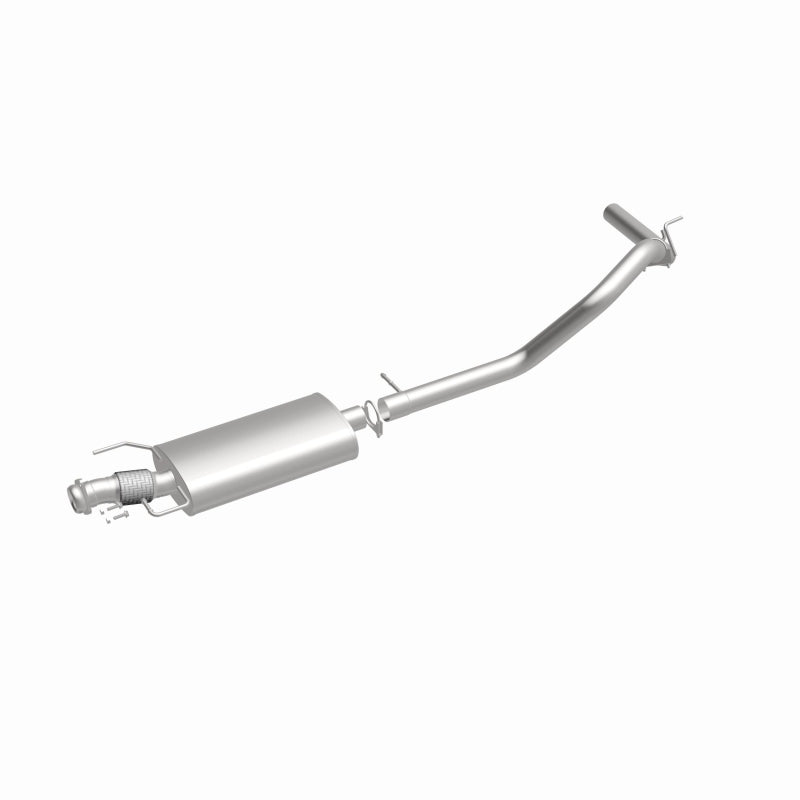 Muffler at left with the pipe rising